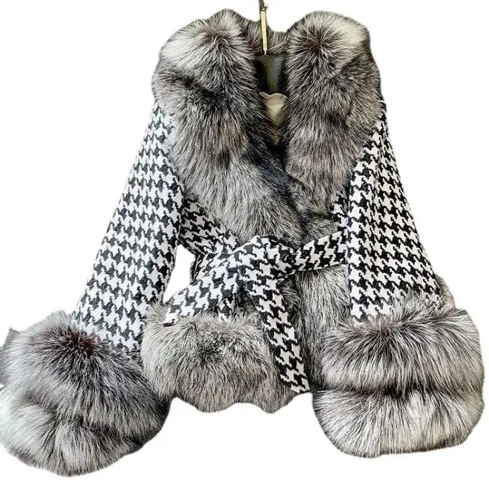 Houndstooth coat with faux fur trim, detail of luxurious gray fur collar, belted waist, classic pattern shown.