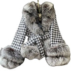Houndstooth coat with faux fur trim, detail of luxurious gray fur collar, belted waist, classic pattern shown.