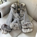 Houndstooth coat with faux fur trim, flat lay view showing gray fur collar, cuffs, and belted waist design.