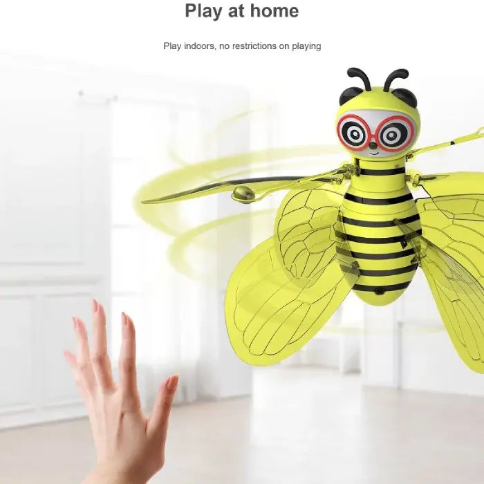 Interactive flying bee robot demonstrating indoor play features in bright living room setting with gesture-based control system