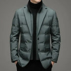 Insulated green jacket styled as formal outerwear with blazer details and front pockets