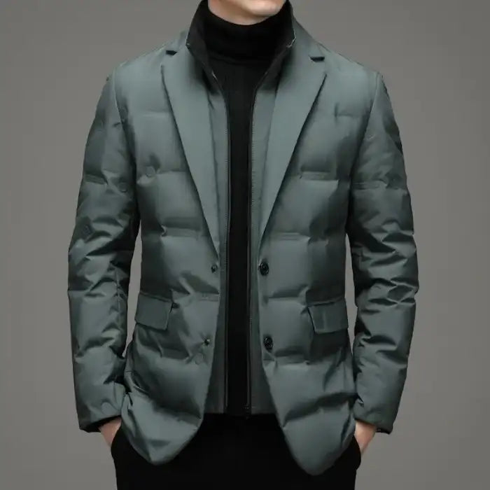 Insulated green jacket styled as formal outerwear with blazer details and front pockets