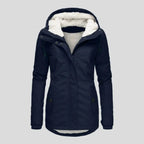 Insulated parka in navy blue for women featuring warm fur lining and zip front