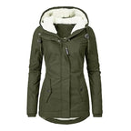Insulated parka in olive green with cozy fur hood lining and buttoned pockets