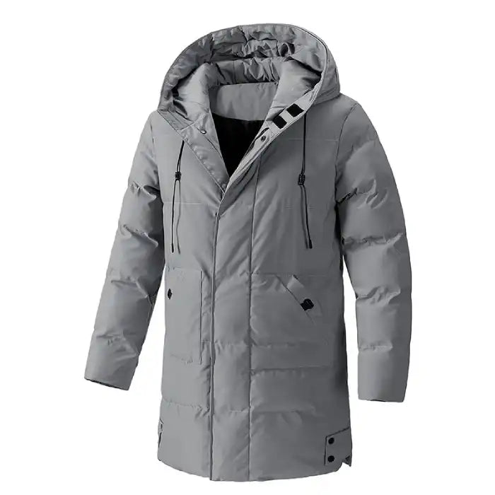 Insulated winter coat in light grey color with long padded design and adjustable hood for winter warmth.