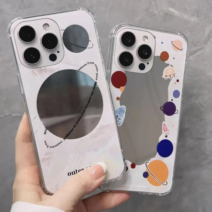 iPhone 15 case with transparent background decorated with colorful planets, rocket ships and space elements around the edges