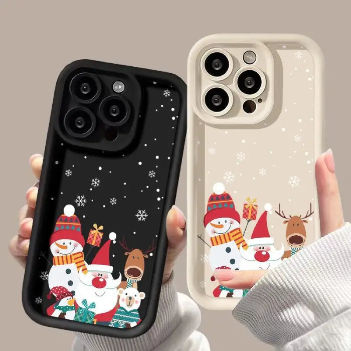 Iphone case in white and black with Christmas decorations, snowman, santa, rudolf a penguin and white bear.  Compatible with iphone 12-16