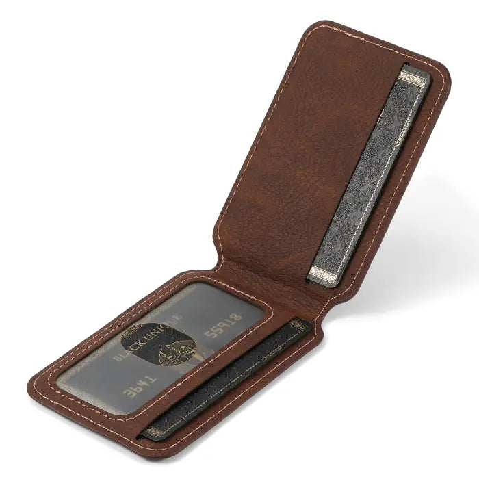 Brown leather iPhone card holder case opened to display transparent ID slot and card pocket.