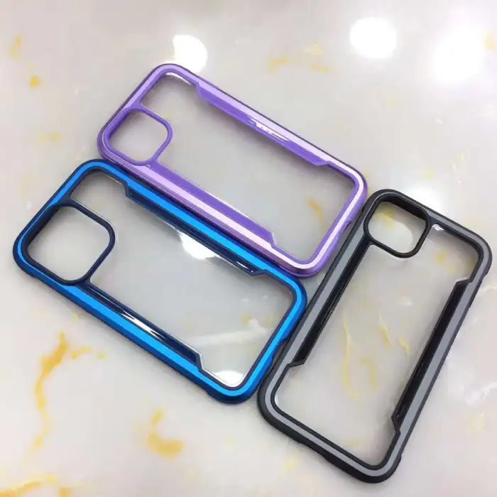 iPhone case variety showcasing multiple colored protective bumpers including purple, black, red and blue with transparent back panels