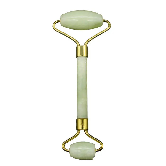 Jade facial roller with gold accents on a white background