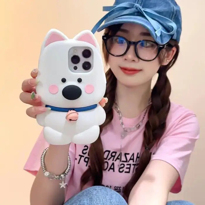 kawaii dog phone case with a 3D white dog design, held by a smiling person in a pink shirt.