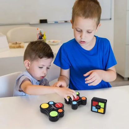 Two children playing with colorful memory game toys at a table.