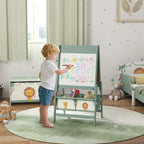 Boy drawing on kids whiteboard learning organizer with toy storage in a cozy bedroom.