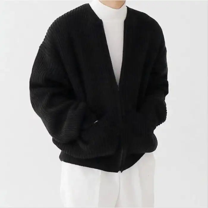 Knit Cardigan in black styled with white turtleneck and pants for a clean, minimal menswear outfit.