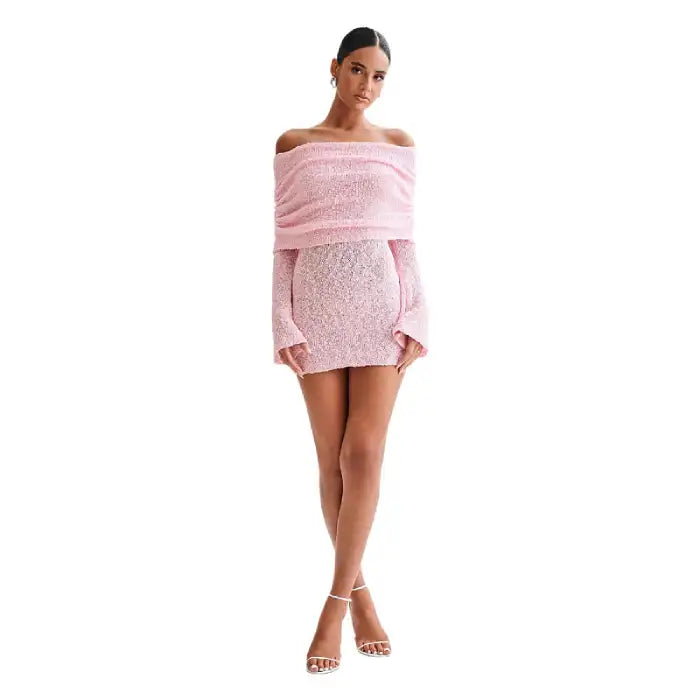  Knitted dress in pink with long sleeves and off-shoulder cut shown in full-body front pose.