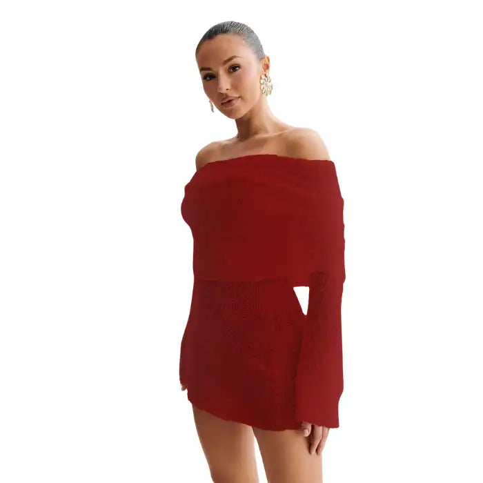 Knitted dress in red shown close-up with rich texture and off-shoulder wrap styling.
