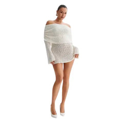 Knitted dress in white styled with long sleeves and elegant off-shoulder cut in front pose.