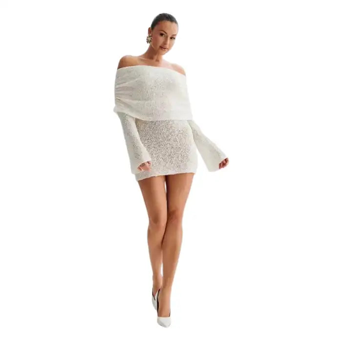 Knitted dress in white with off-shoulder style, long sleeves, and mini length front view.