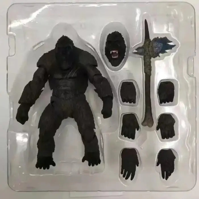 Kong action figure in packaging showcasing parts and accessories from Godzilla vs Kong 2021 movie.