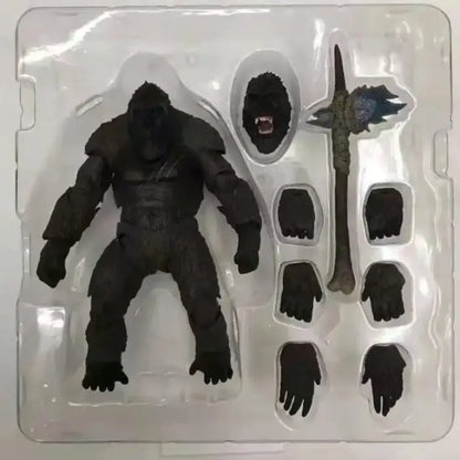 Kong action figure in packaging showcasing parts and accessories from Godzilla vs Kong 2021 movie.