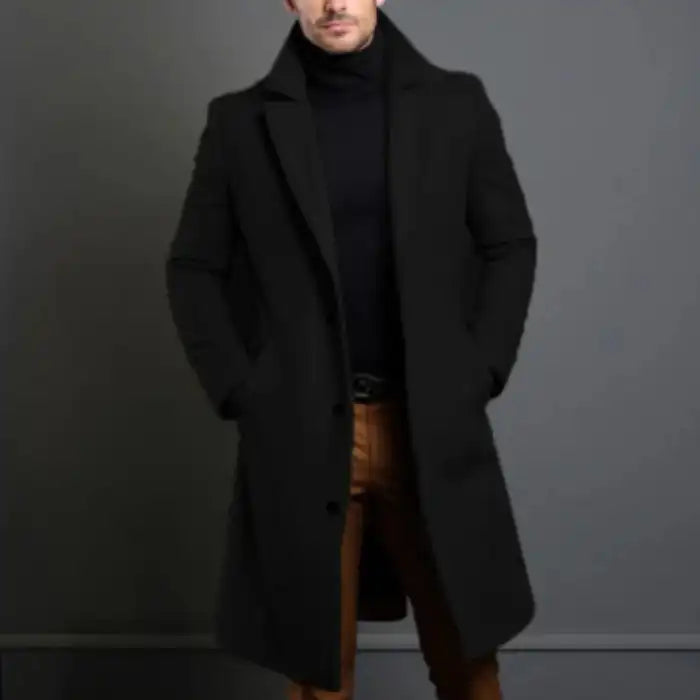Black lapel trench coat paired with brown pants and black turtleneck for a sleek formal outfit.
