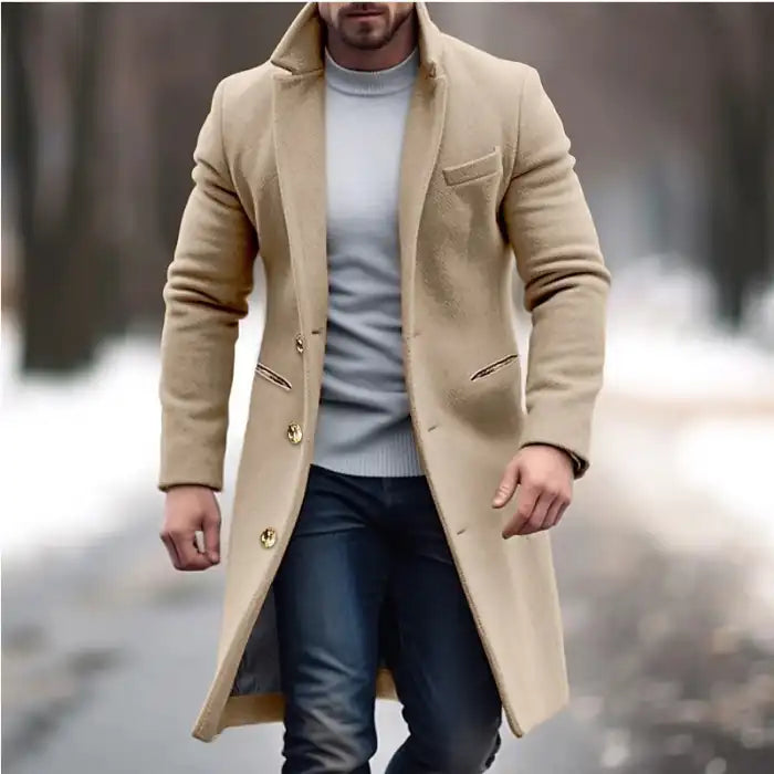 Lapel trench coat in khaki paired with casual jeans and sweater for a modern winter outfit.