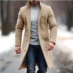 Lapel trench coat in khaki paired with casual jeans and sweater for a modern winter outfit.