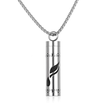 Stainless steel aromatherapy pendant with leaf design cutout and black insert for essential oil diffusion.