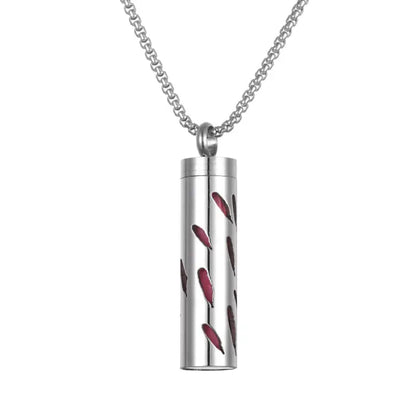 Titanium steel aromatherapy pendant with red leaf pattern for essential oil diffusion necklace.