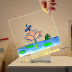 LED acrylic drawing board featuring lotus flower and dragonfly artwork with glowing water details, enhancing relaxing creative art sessions.