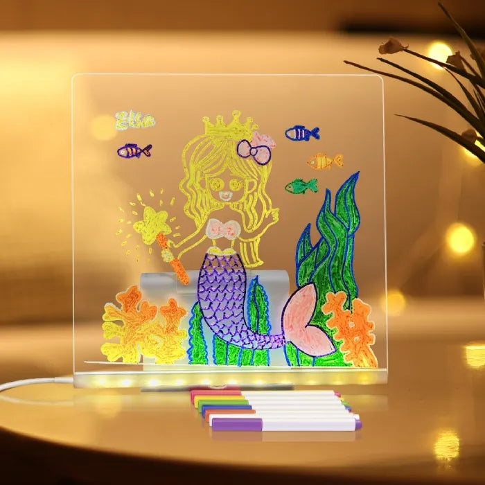 LED acrylic drawing board featuring colorful mermaid illustration with glowing ocean details, inspiring kids’ creativity on a bright art surface.