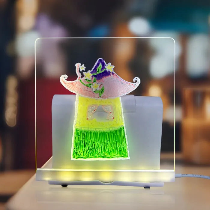 LED acrylic drawing board showing a bright decorative sketch under warm lighting, creating a glowing art display for creative décor.