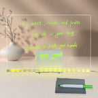 LED acrylic drawing board showing handwritten neon reminder note with soft glowing edges, offering a bright light-up message for families.