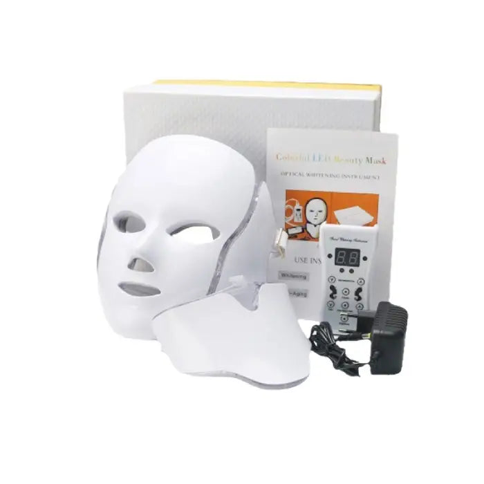 LED Beauty Mask full kit with mask, controller, cables, and packaging contents unboxed.