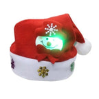 LED Christmas hat with snowman face and green glow, featuring a red bow and festive embellishments.