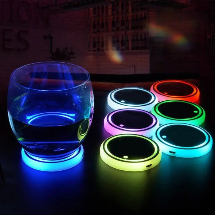 Custom coasters with LED lighting in multiple colors displaying blue glass and illuminated drink holders