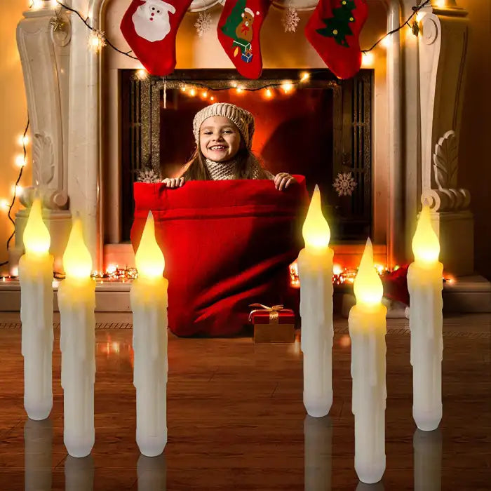 LED Halloween Candle Set displayed by a fireplace with festive holiday decor and child.