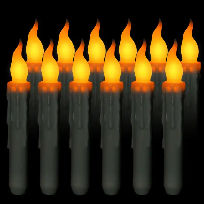  LED Halloween Candle Set glowing with warm orange flames, ideal for spooky decorative lighting.