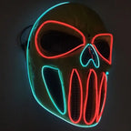 LED Halloween Mask with red and blue glow lighting up in the dark with skull design and neon effect.