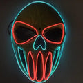 LED Halloween Mask fully lit with red and blue neon lines outlining skull face in dark environment.
