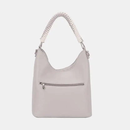 Light gray hobo bag with braided handle and exterior zipper pocket, showcasing minimalist design