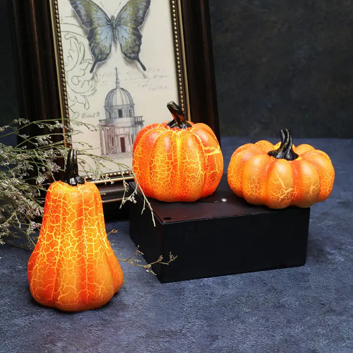 Light up pumpkin decorations set of three with glowing finish for autumn and Halloween decor