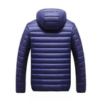  Lightweight quilted puffer jacket with hood in navy blue, back view showing horizontal quilted pattern across shoulders.