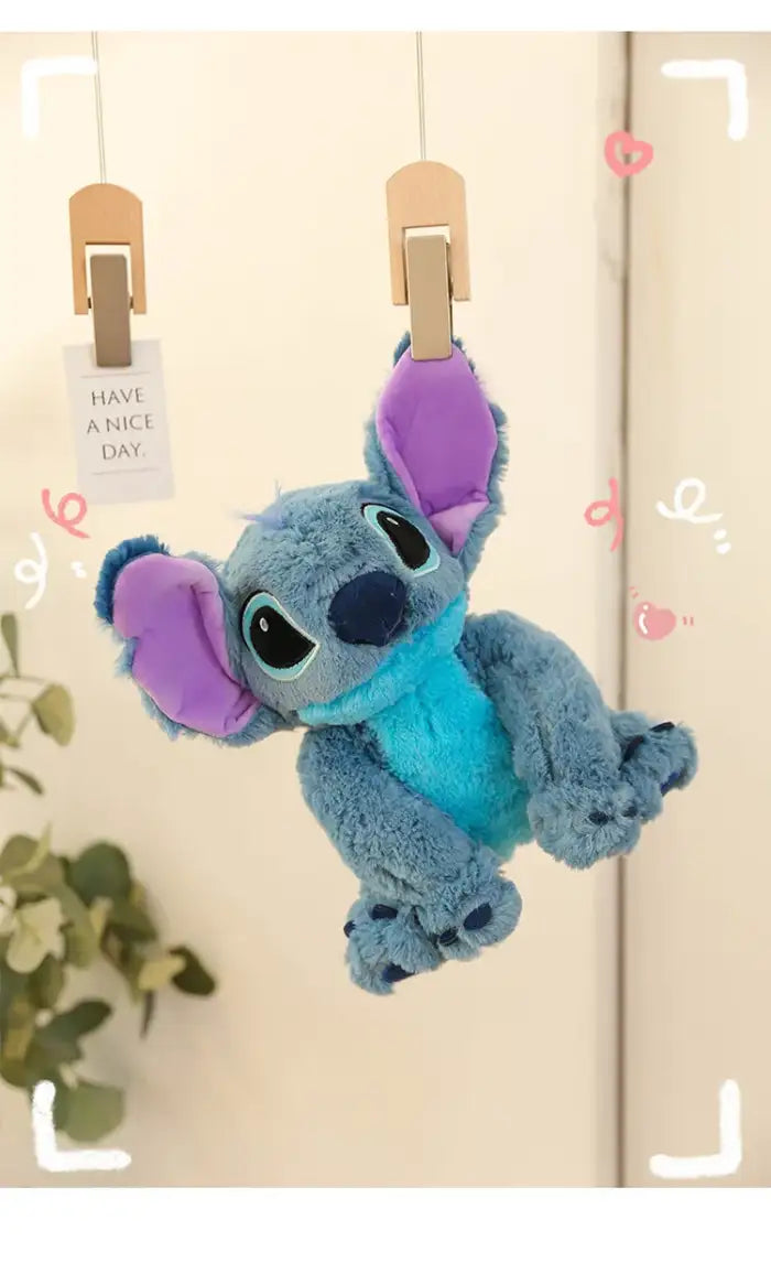 lilo and Stitch plush toy hanging from clips with fun decorations and soft lighting