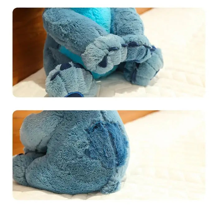lilo and stitch plush details showing feet and back with spotted blue design on bed