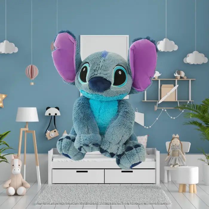 lilo and stitch blue plush toy in child’s room with blue wall and cute hanging decor