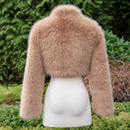 long sleeve faux fur bolero jacket back view in warm tan highlighting plush faux fur texture perfect for stylish winter event outfits