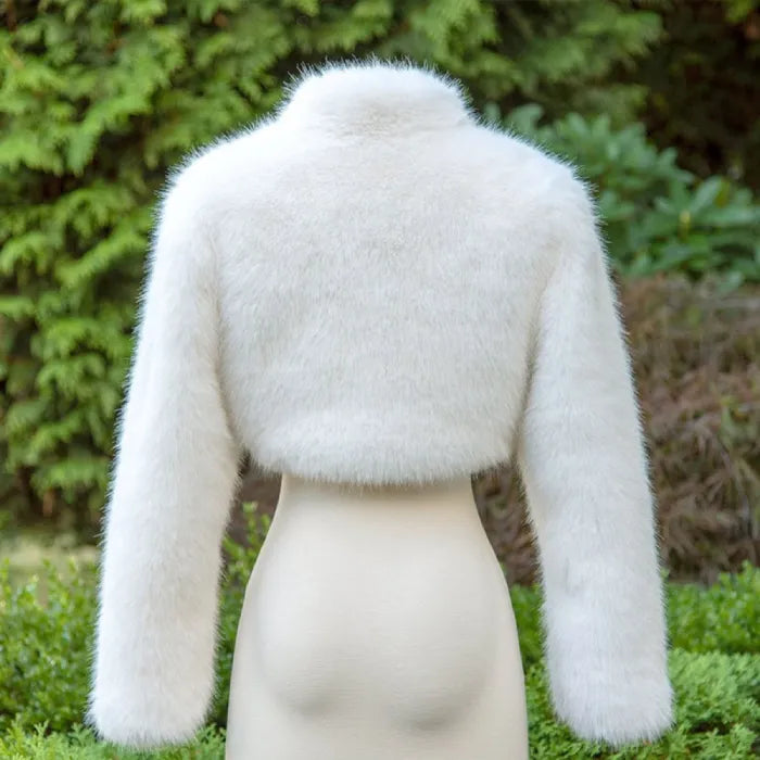 long sleeve faux fur bolero jacket back view in soft white shown on mannequin, ideal for bridal winter cover-ups and formal styling