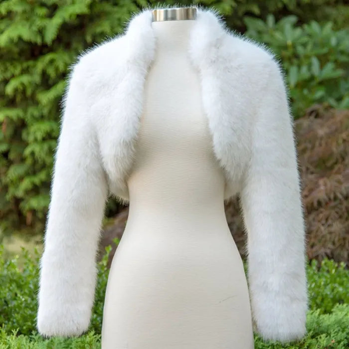 long sleeve faux fur bolero jacket in classic white displayed on mannequin, ideal for weddings, parties, and elegant winter outfits