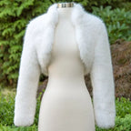 long sleeve faux fur bolero jacket in classic white displayed on mannequin, ideal for weddings, parties, and elegant winter outfits